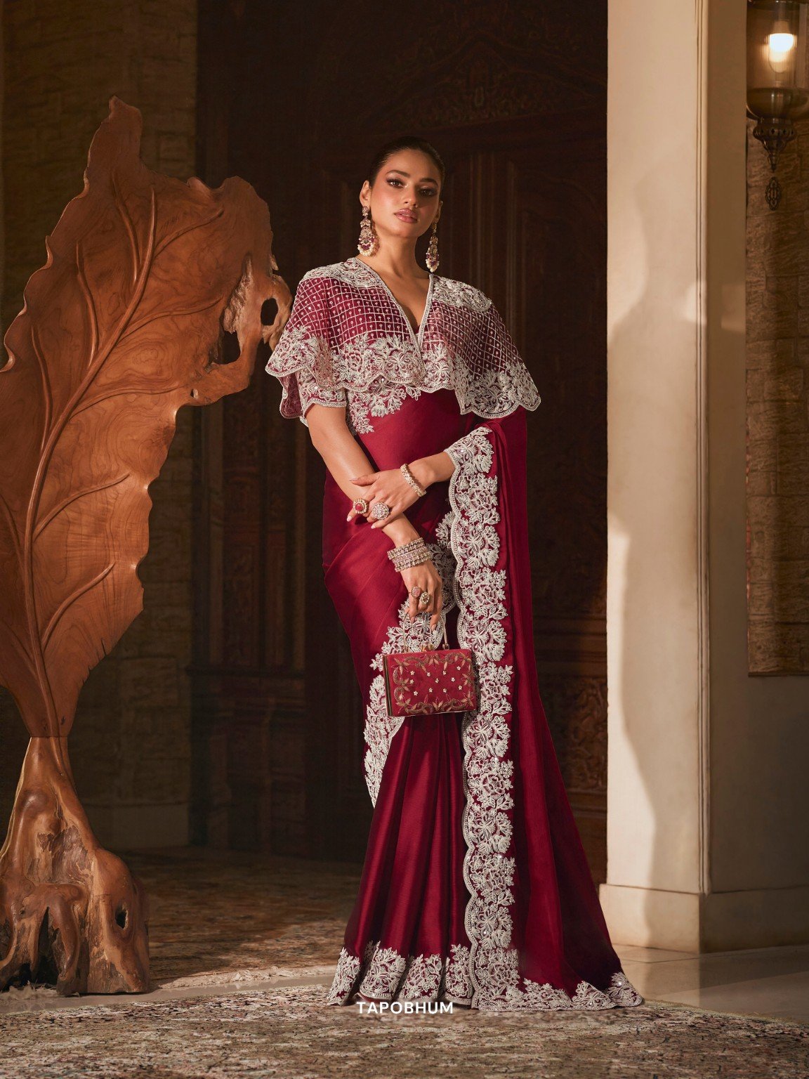 Maroon ready-to-wear saree with embroidered detailing